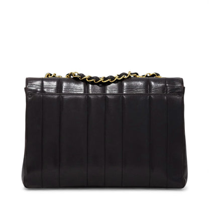 Chanel Vintage Mademoiselle Vertical Quilted Flap Bag